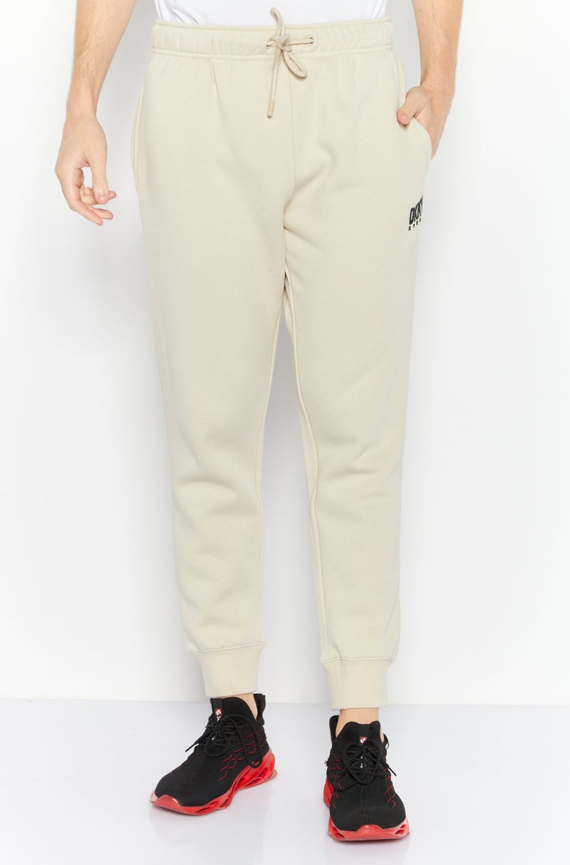 DKNY Sport Men Sportswear Fit Brand Logo Walking Jogger Pants, Oatmeal - Image 1