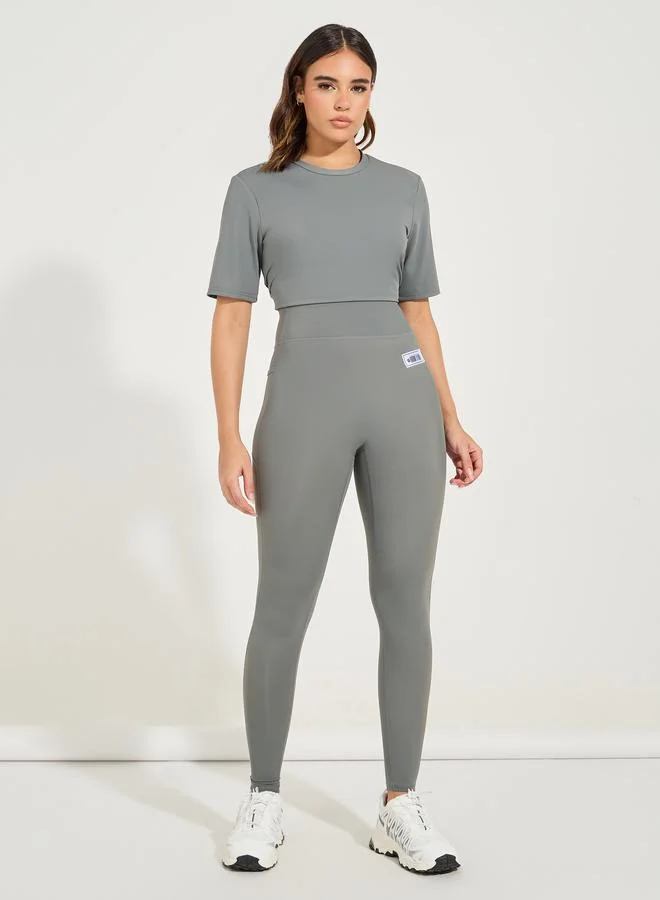 Styli Active grey Gymspire Edition - Label Back Stitch Contour Detail Leggings for Women | Best Price UAE