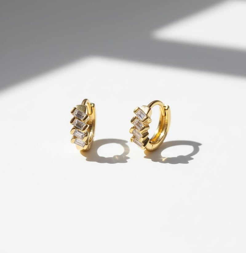 A delicate gold-plated hoop featuring a dazzling zircon stone design. A modern touch of elegance that illuminates your look with a captivating sparkle and unparalleled appeal. - Image 3