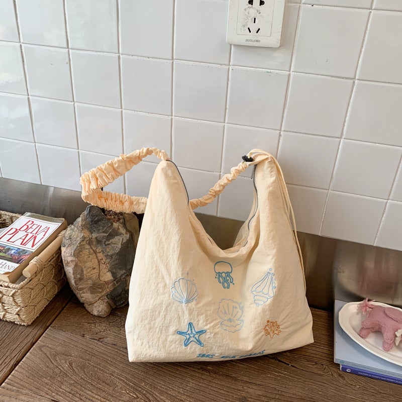 Korean Style Casual Canvas Crossbody Bag with Embroidery - Image 1
