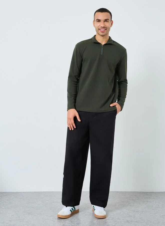 Styli Pebble Textured Relaxed Fit Quarter Zip Sweatshirt