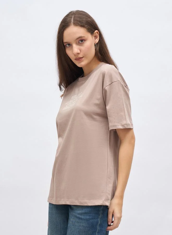 Styli Styli Beige Slogan Print Oversized T-Shirt