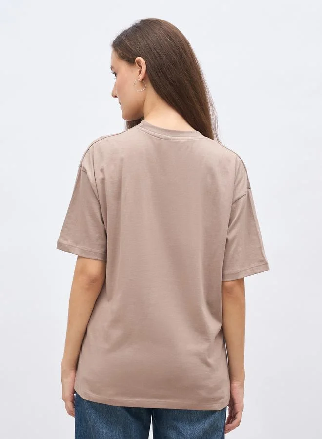 Styli Styli Beige Slogan Print Oversized T-Shirt
