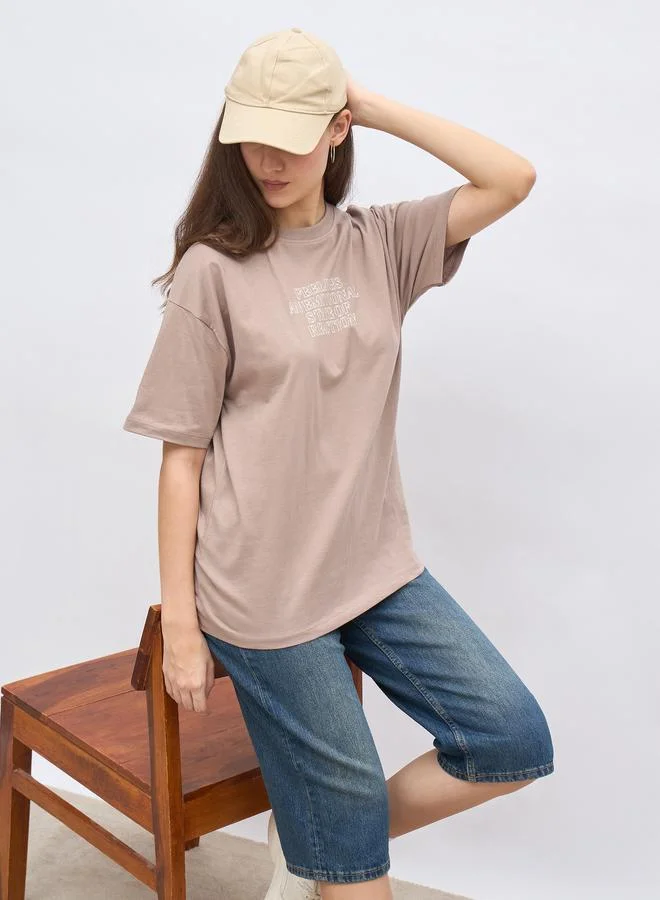 Styli Styli Beige Slogan Print Oversized T-Shirt