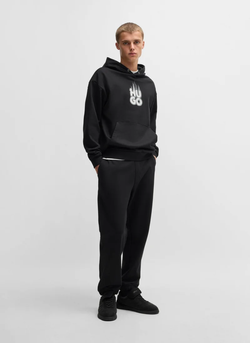 HUGO Cotton-terry tracksuit bottoms with smoke logo