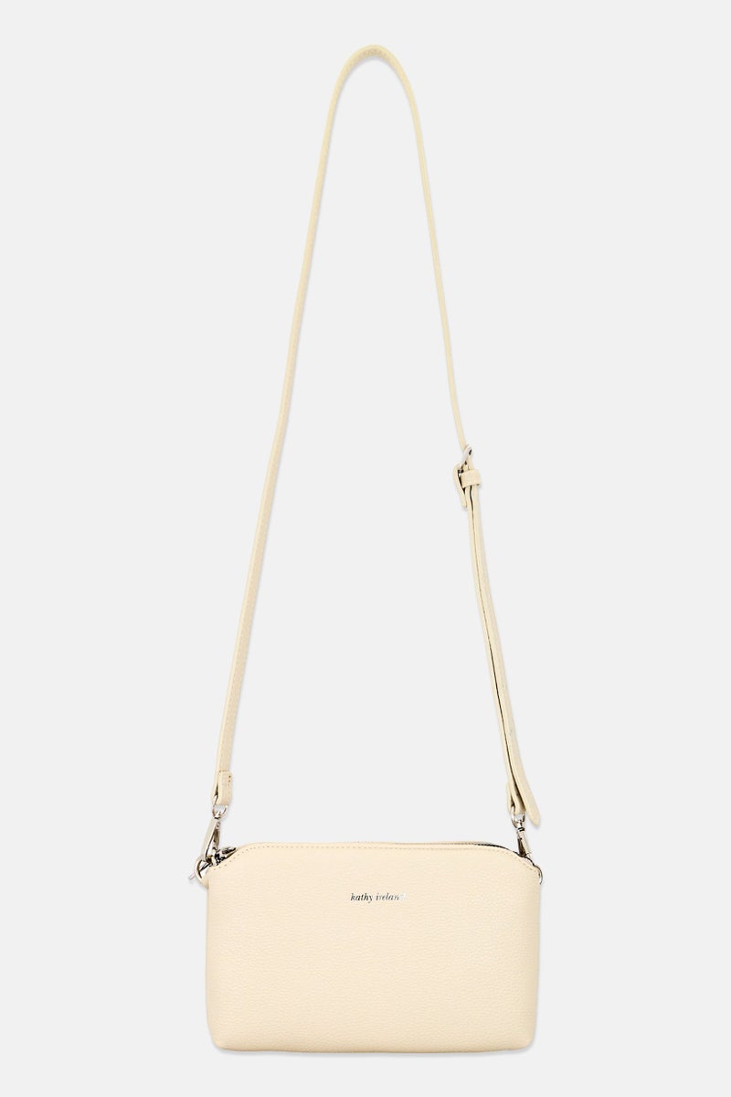 Kathy Ireland Women Brand Logo Cross Body Bag, Cream - Image 1