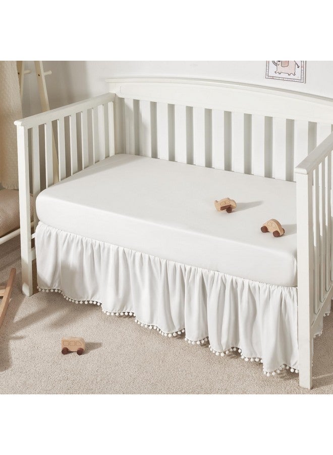 TILLYOU Baby Crib Skirt Girls Boys, Ruffled Bed Skirt with Pompoms, 28”x 52”, 14'' Drop, White - Image 1