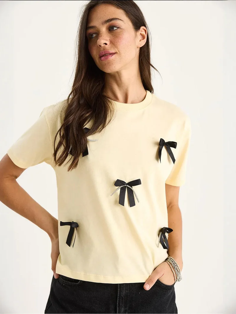 Bianco Lucci LUCCI Patterned Crop T-Shirt with Accessory Detail