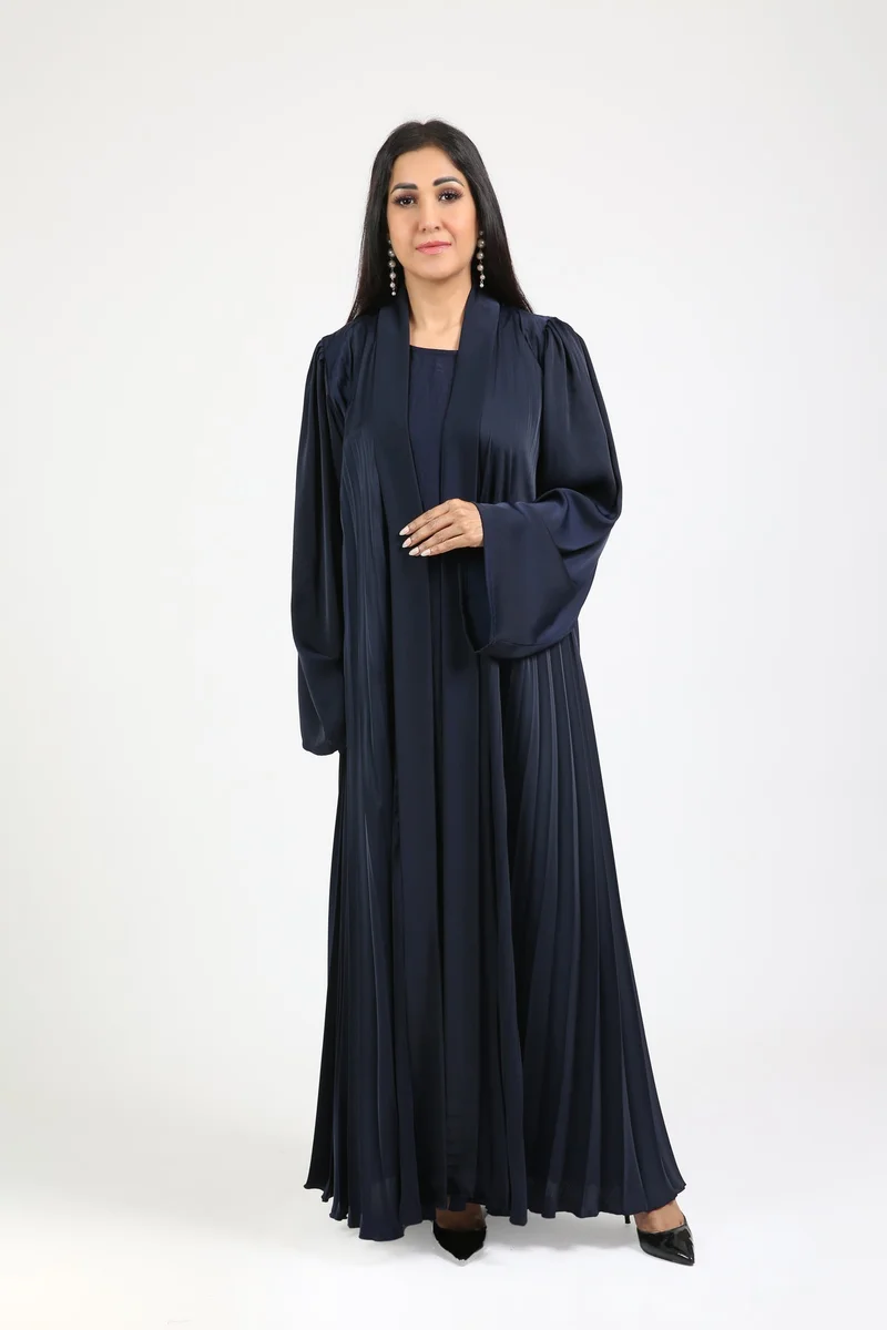 Nikias navy blue tiktok fabric with inner and pleated abaya with a big bottom very flowy and elegant.