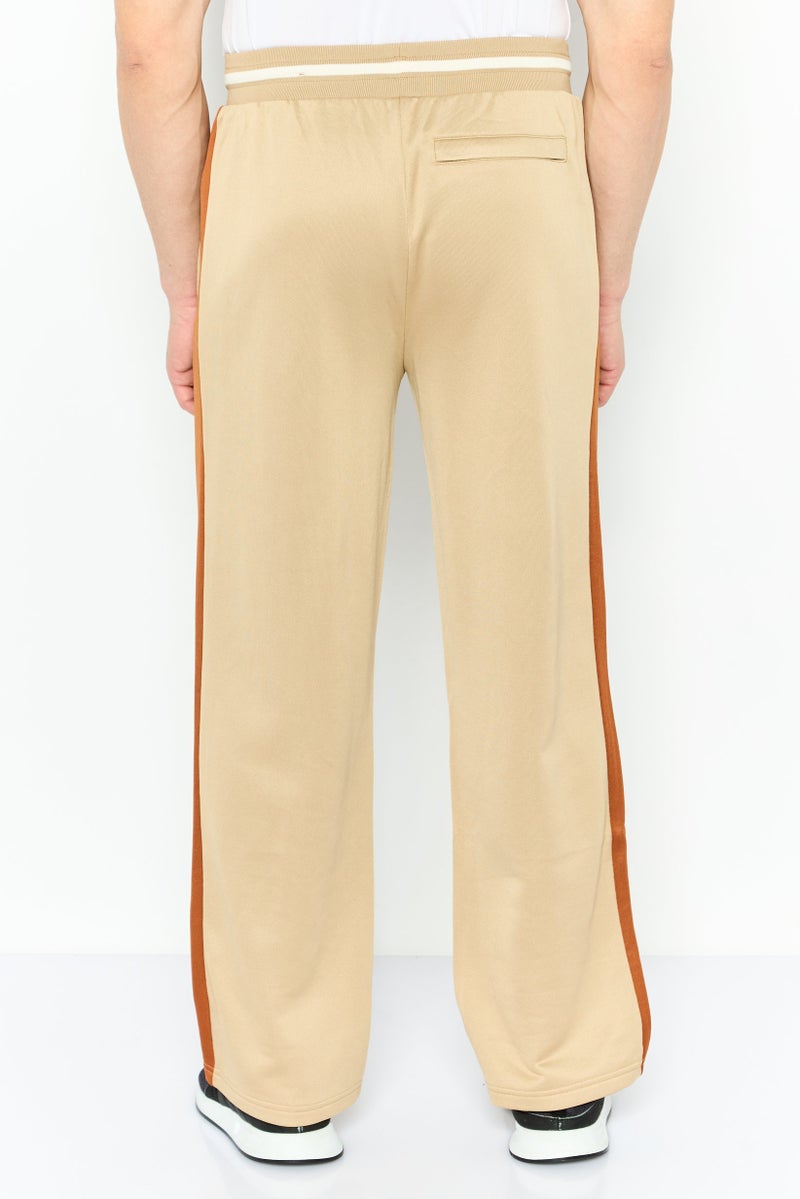 PUMA Men Relaxed Fit Embroidered Logo Training Sweatpant, Tan Combo  - Image 4