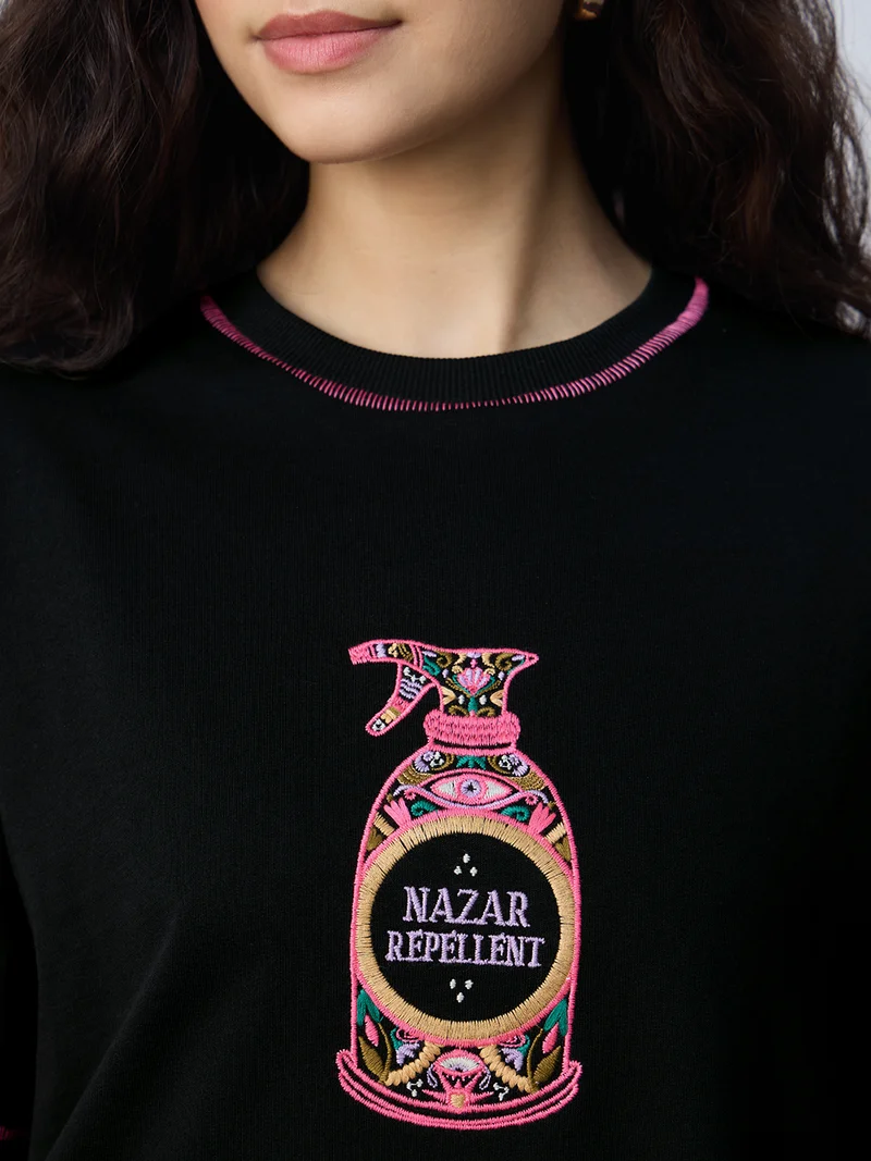 The Souled Store  The Souled Store Nazar Repellent: Women and Girls Short Sleeves Round Neck Embroidered Cotton Oversized Lightweight Everyday Streetwear T-Shirt  | Best Price UAE
