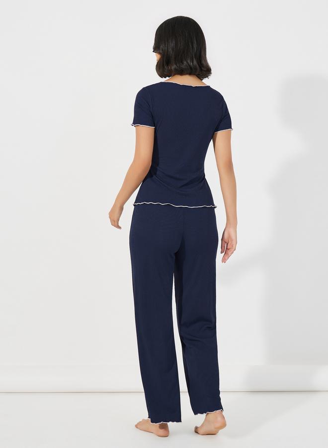 ستايلي مجموعة من بنطال بيجاما مع تيشيرت بنمط لف - Image 4