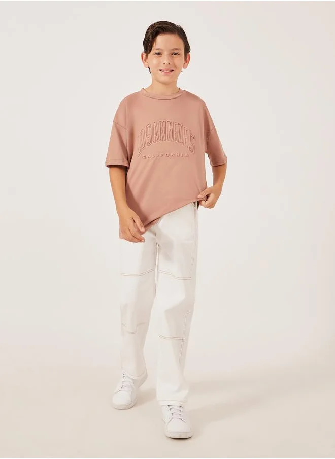 ستايلي Styli Embossed Slogan Round Neck Oversized T-Shirt