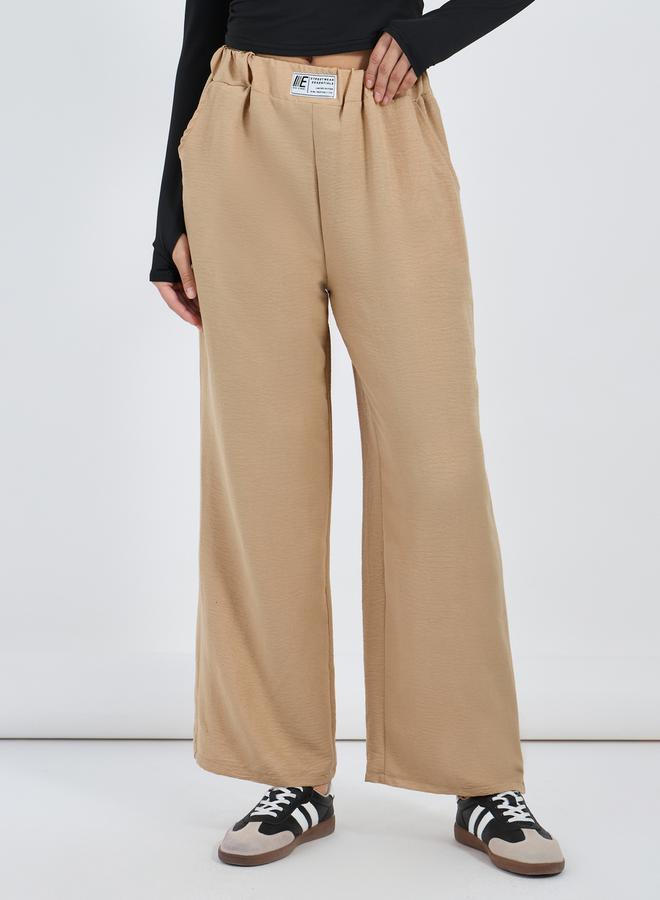 Styli Textured Mid Rise Wide Leg Pants with Badge Detail  - Image 2