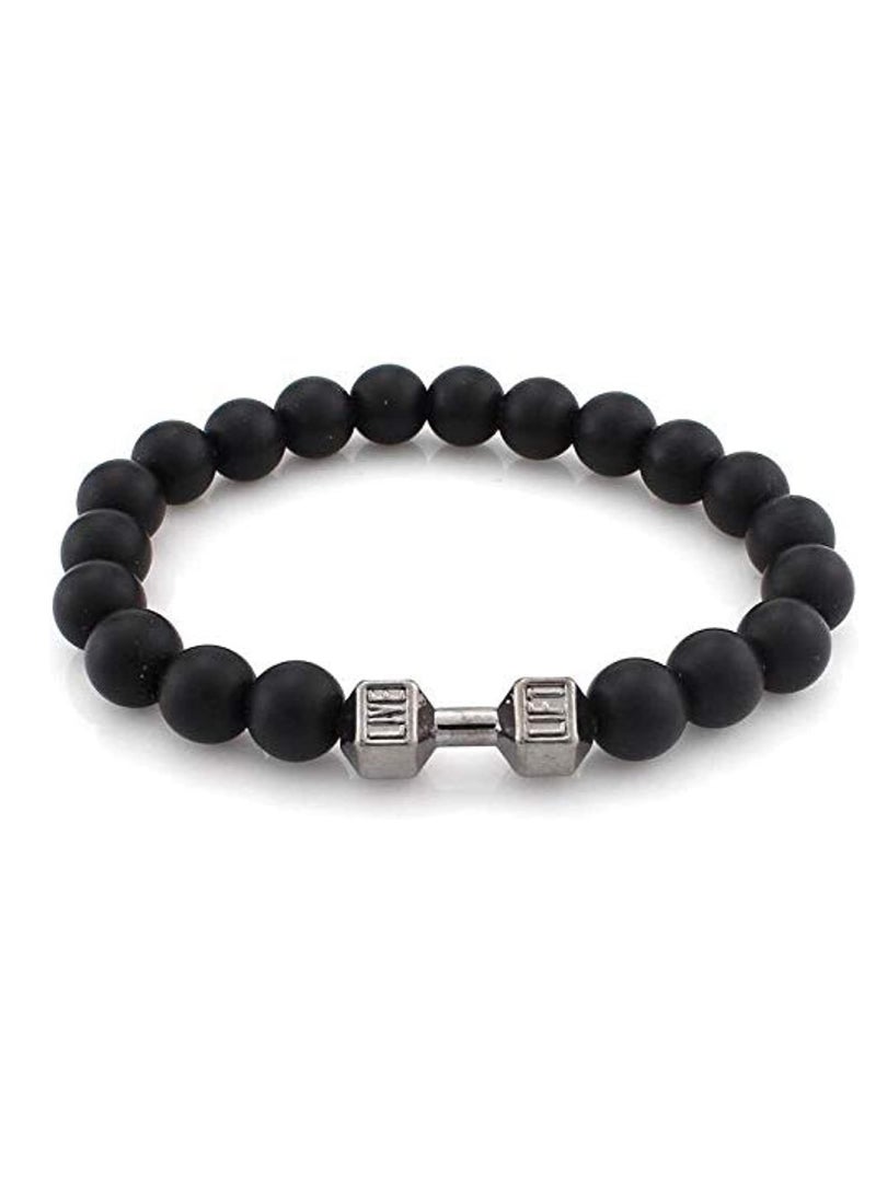 اسوارة للجنسين من المعدن لون فضي وخرز لافا طبيعي اسود قابل للتمدد بمظهر أنيق - Image 1