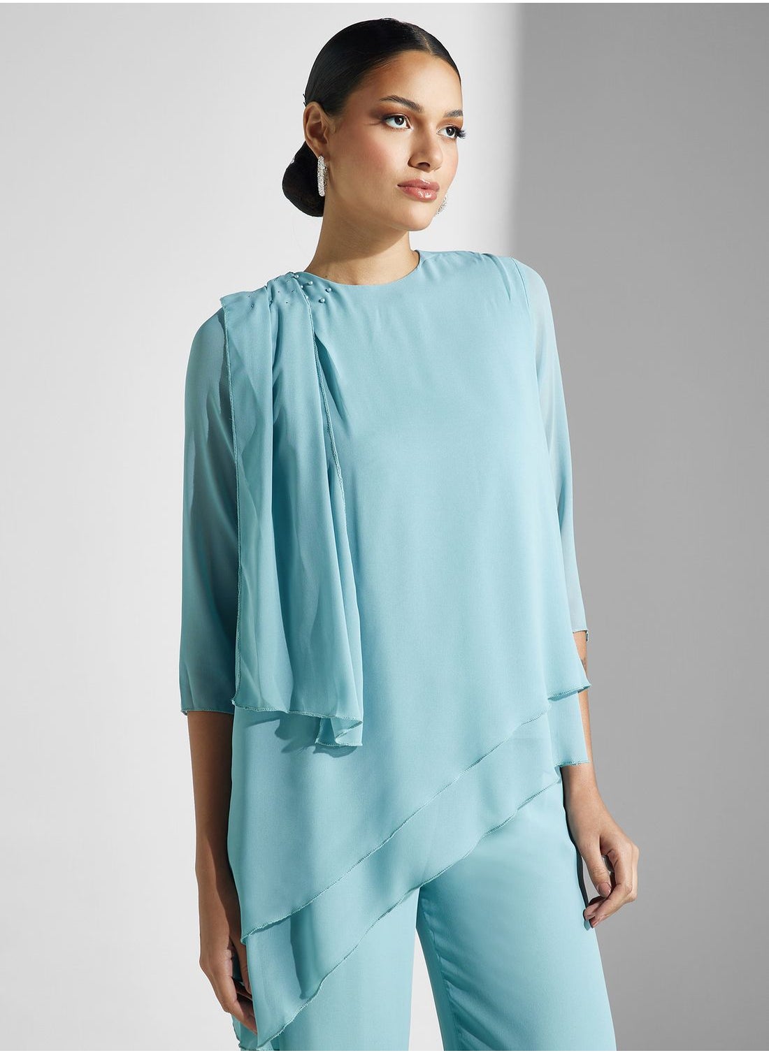 Asymmetrical Styled Hem Jumpsuit - https://f.nooncdn.com/p/pzsku/ZDA9C0C1768AD2EED8EDCZ/45/_/1713784225/5a9536e4-8b1b-4a4e-8d4c-a8d75cbd633b.jpg?format=jpg&width=original