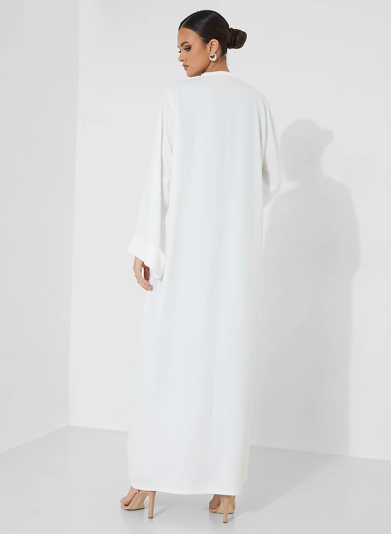 Rosette Abaya Elegant White Abaya with Hand-Embroidered Blue & Pink Butterflies