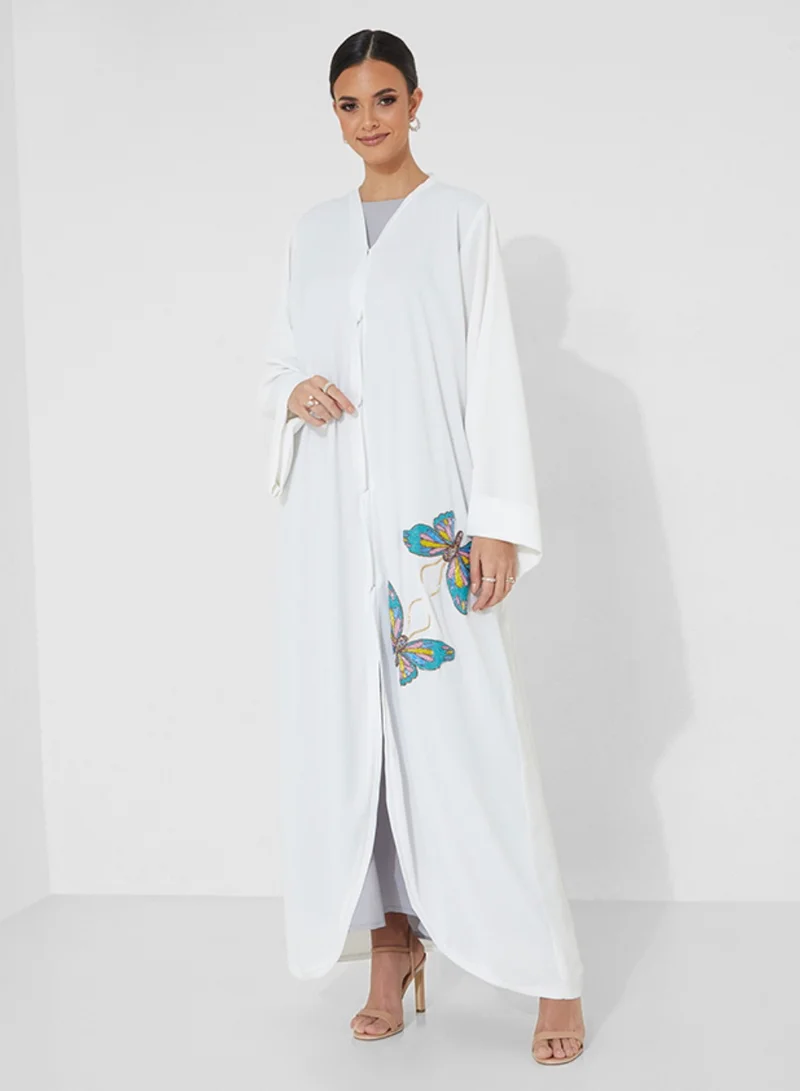 Rosette Abaya Elegant White Abaya with Hand-Embroidered Blue & Pink Butterflies