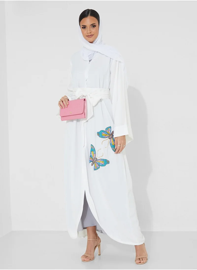 Rosette Abaya Elegant White Abaya with Hand-Embroidered Blue & Pink Butterflies