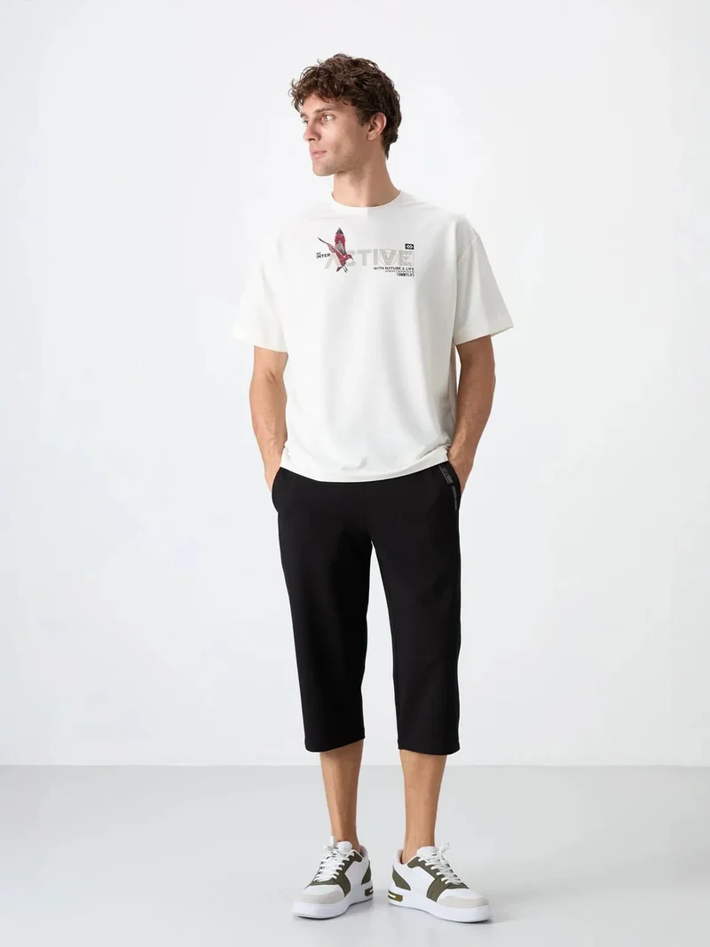 تومي لايف TOMMY Men's Mid-Waist Capri Shorts