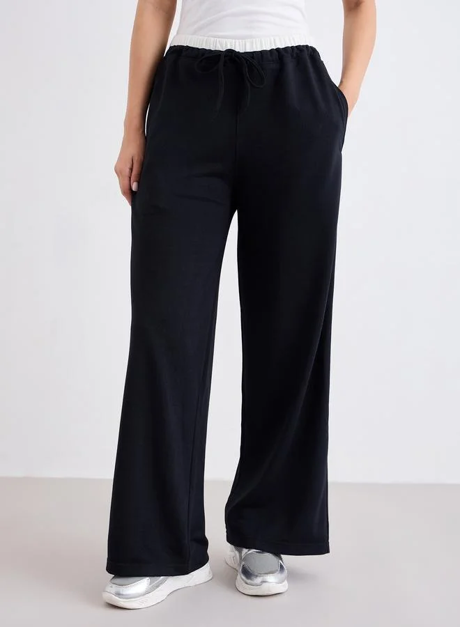 ستايلي جوغر بأرجل واسعة مع أربطة