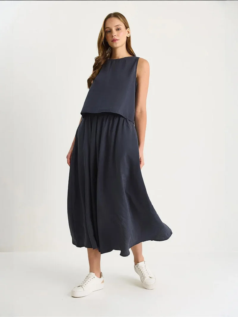 بيانكو لوتشي طقم تونيك طويل بدون أكمام بياقة مستديرة وسروال واسع الساق من لوكسي