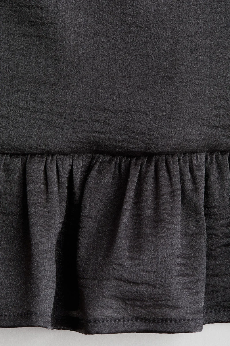 اتش اند ام بلوزة بحافة بيبلوم