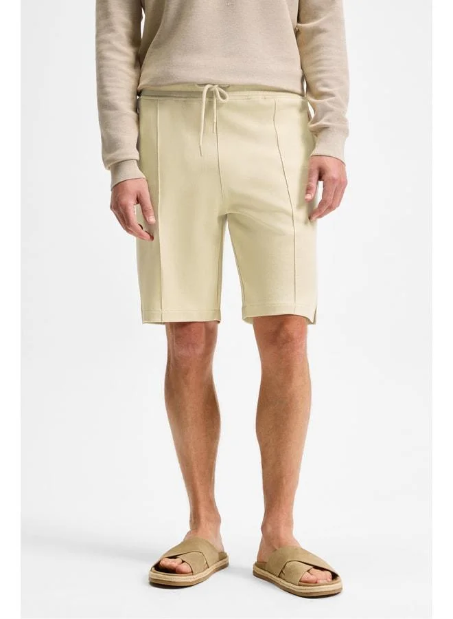Grimelange MATSEN Men's Elastic Waist Side and Back Pocket Relaxed Stone-Colored Shorts