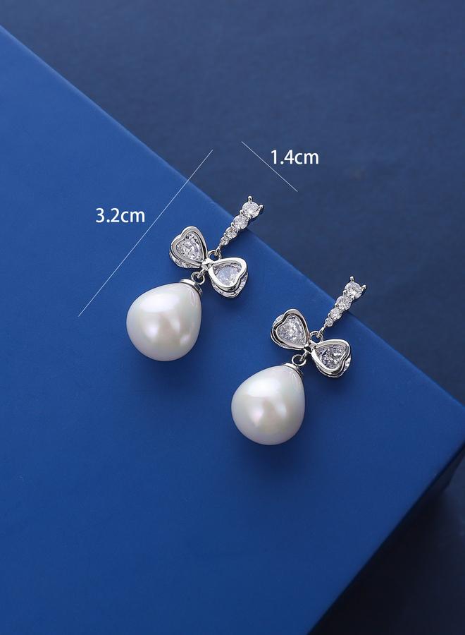 Take Two Silver Faux Pearl Bow Drop Earrings - Image 1