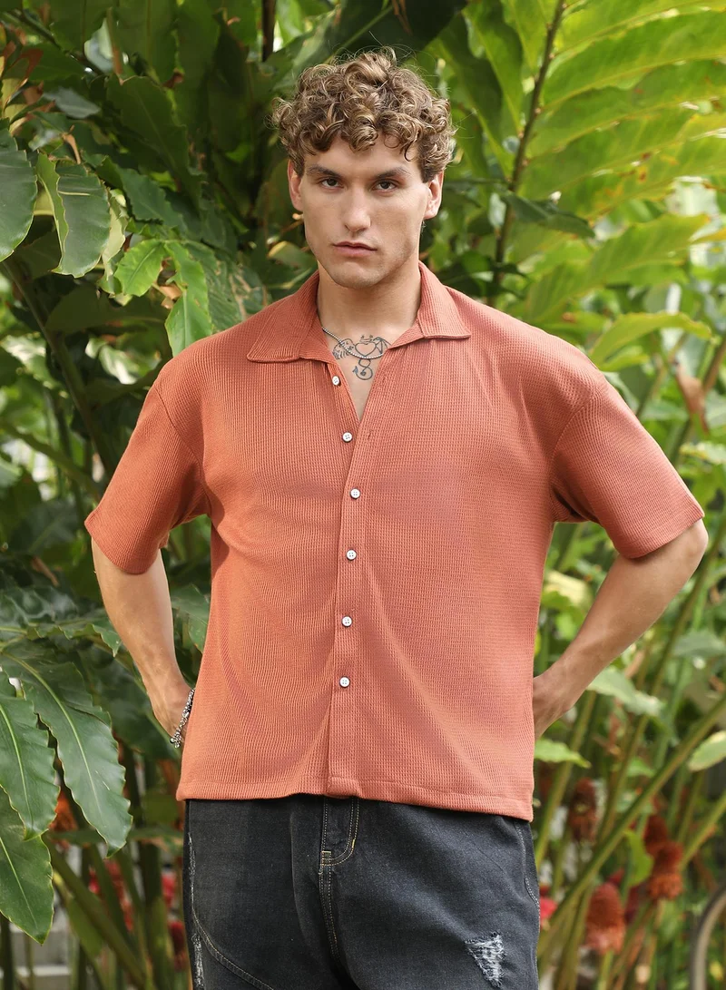 Campus Sutra Men's Burnt Sienna Waffle-Knit Shirt For Casual Wear | Spread Collar | Short Regular Sleeves | Button Closure | Oversized Shirt Crafted With Comfort Fit For Everyday Wear