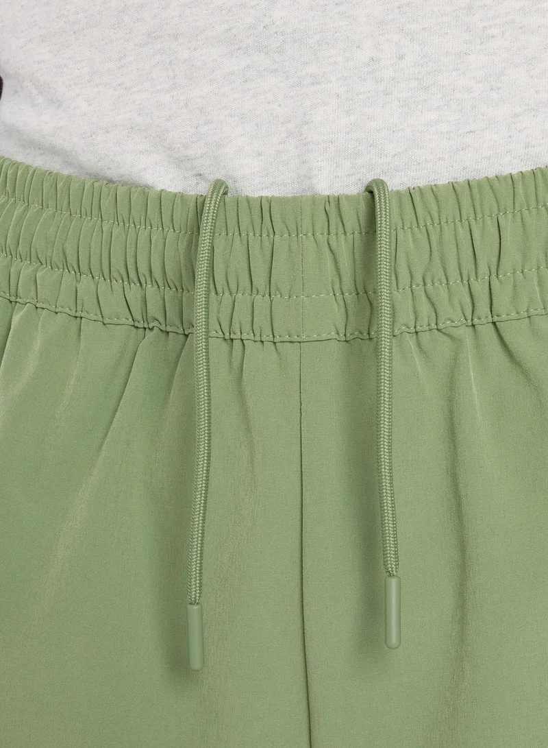 New Balance OREGANO (AAR) 7" Athletics Stretch Woven Shorts for Men | Best Price UAE