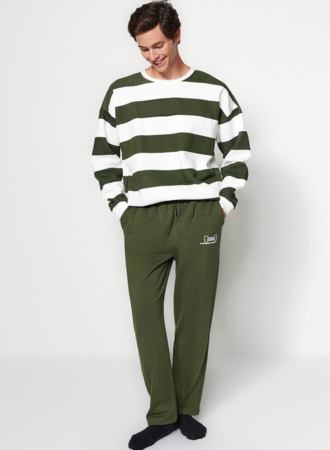 trendyol Khaki Regular/Normal Cut Minimal Fluffy Text Printed Thick Sweatpants with Fleece Inside TMNAW24EA00012  - Image 1