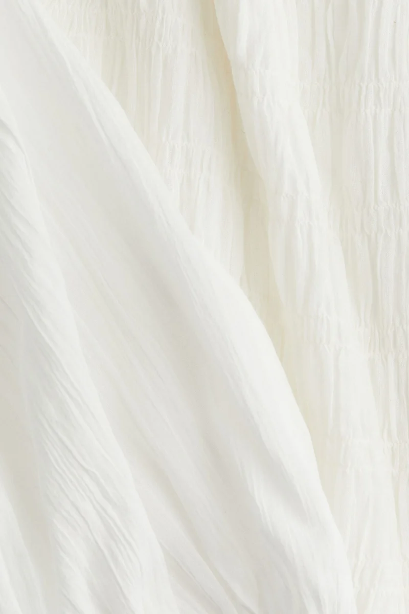 اتش اند ام بلوزة بتصميم مجمّع