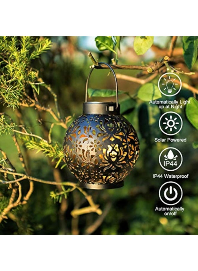 Arabest عبوة 2 من مصابيح الفوانيس الشمسية الخارجية المعدنية LED الزخرفية للحديقة والفناء والساحة والعشب والطاولة بتصميم مجوف (أسود) - Image 2
