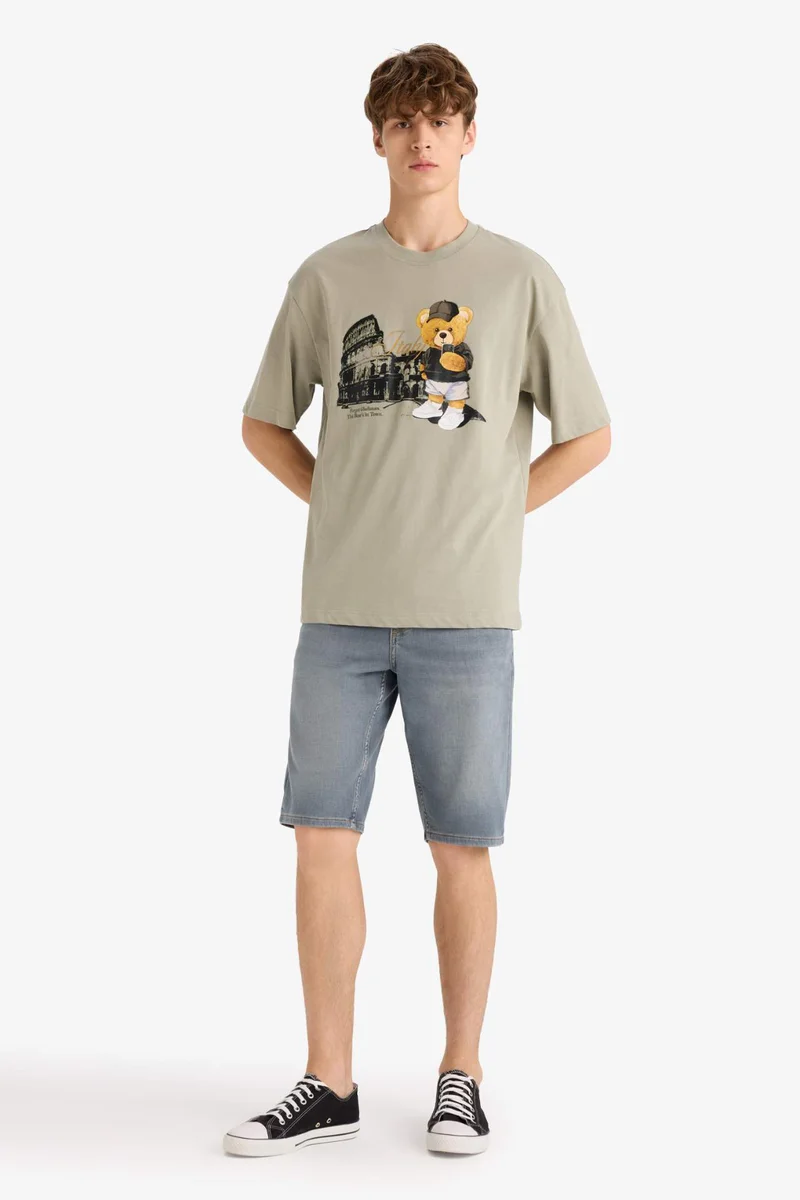 ديفاكتو Boxy Fit Crew Neck Printed Short Sleeve T-Shirt