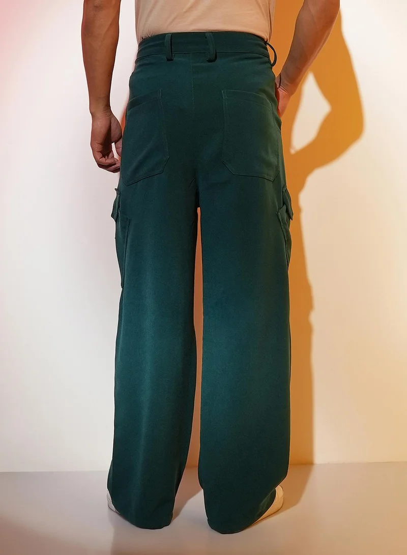 Campus Sutra Men's Emerald Green Asymmetrical Parachute Trousers