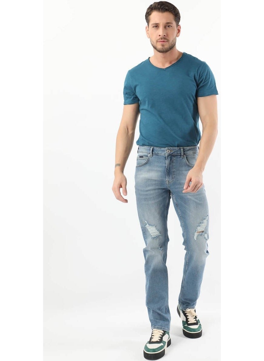 Banny Jeans جينز أزرق مقاس عادي للرجال بتمزق عند الركبة  - Image 1