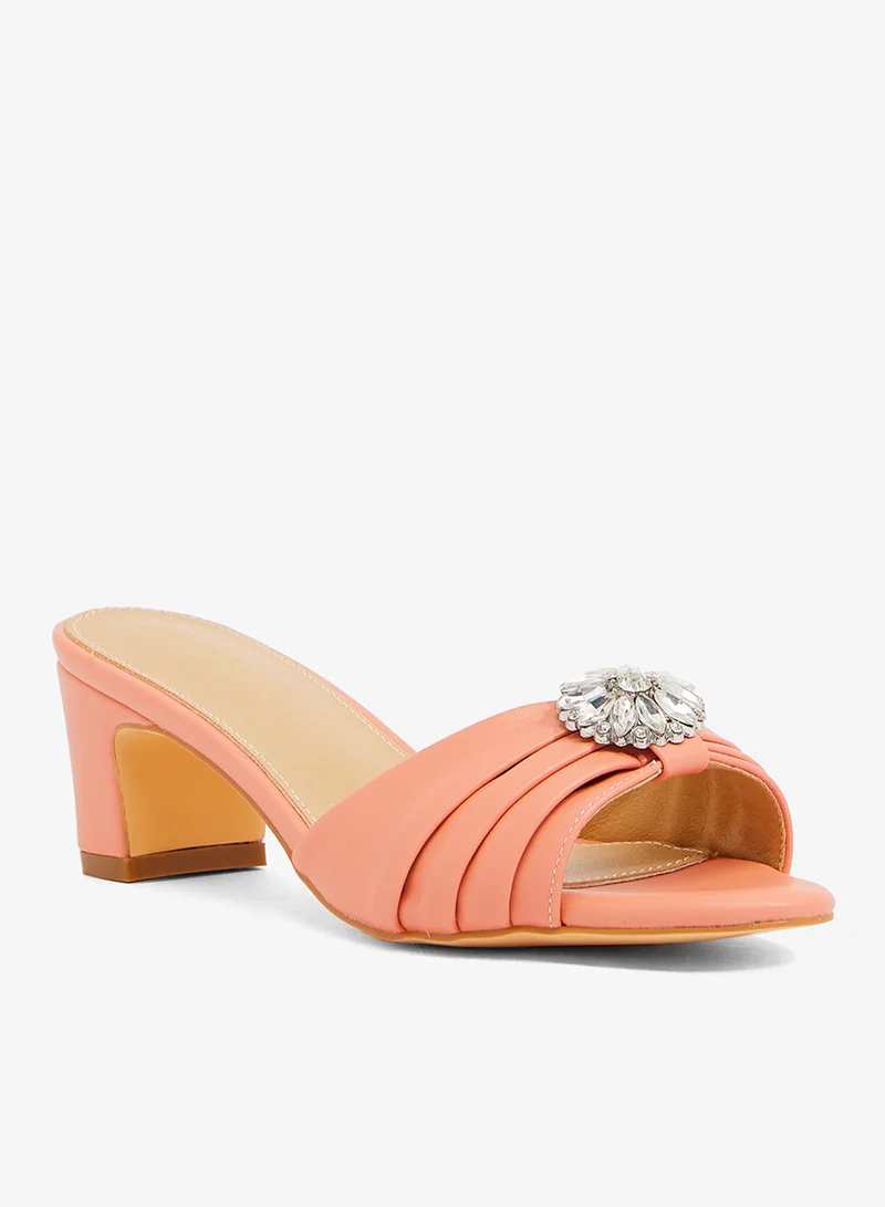 Khizana peach suede gathered upper sandal with block heel, and encrusted buckle