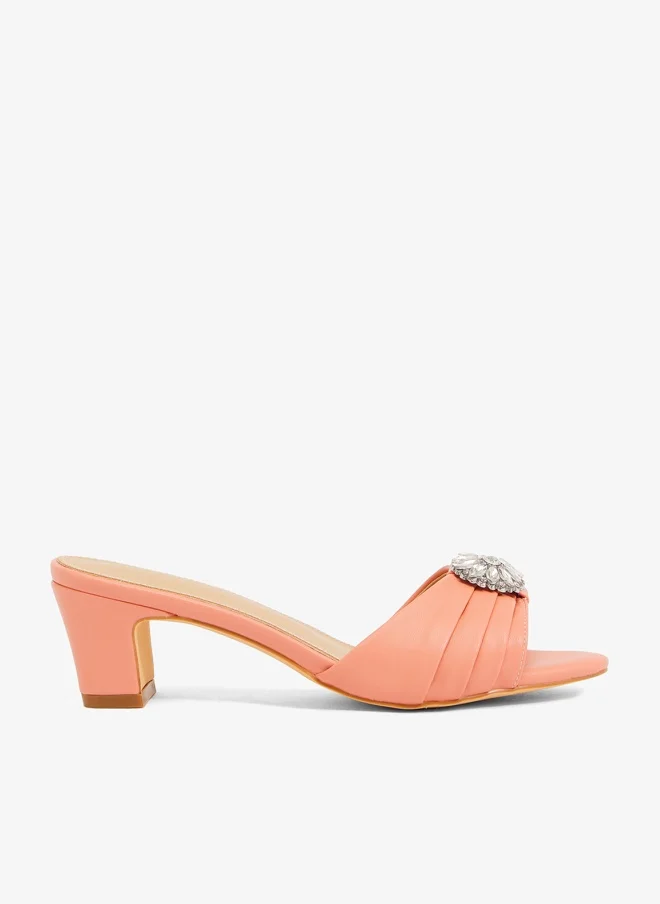 Khizana peach suede gathered upper sandal with block heel, and encrusted buckle