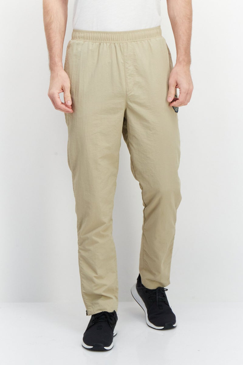 FILA Men Tapered  Fit Tettnang Drawstring Outdoor Track Pants, Tan  - Image 1