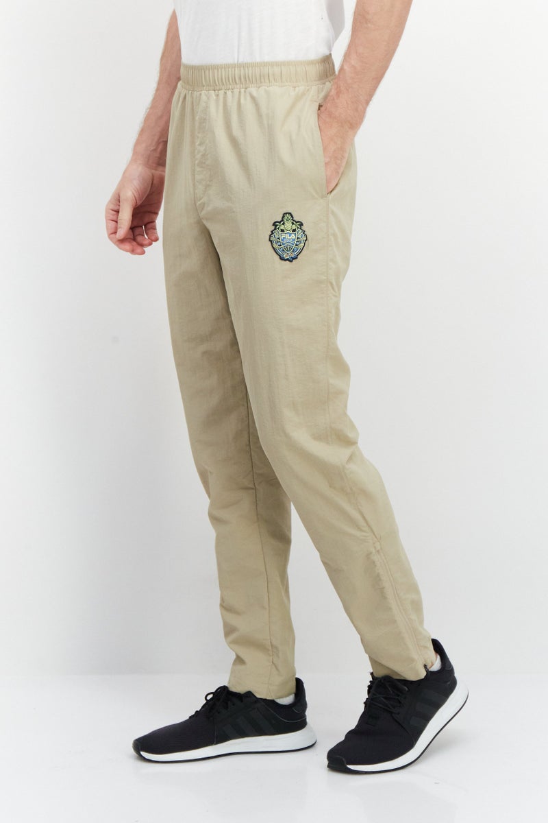 FILA Men Tapered  Fit Tettnang Drawstring Outdoor Track Pants, Tan  - Image 3