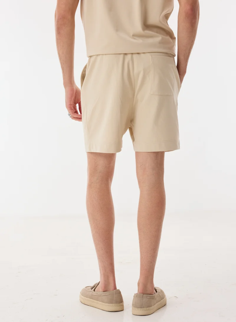 Ashita Fernandes  Solid Relaxed Fit Shorts for Men | Best Price UAE