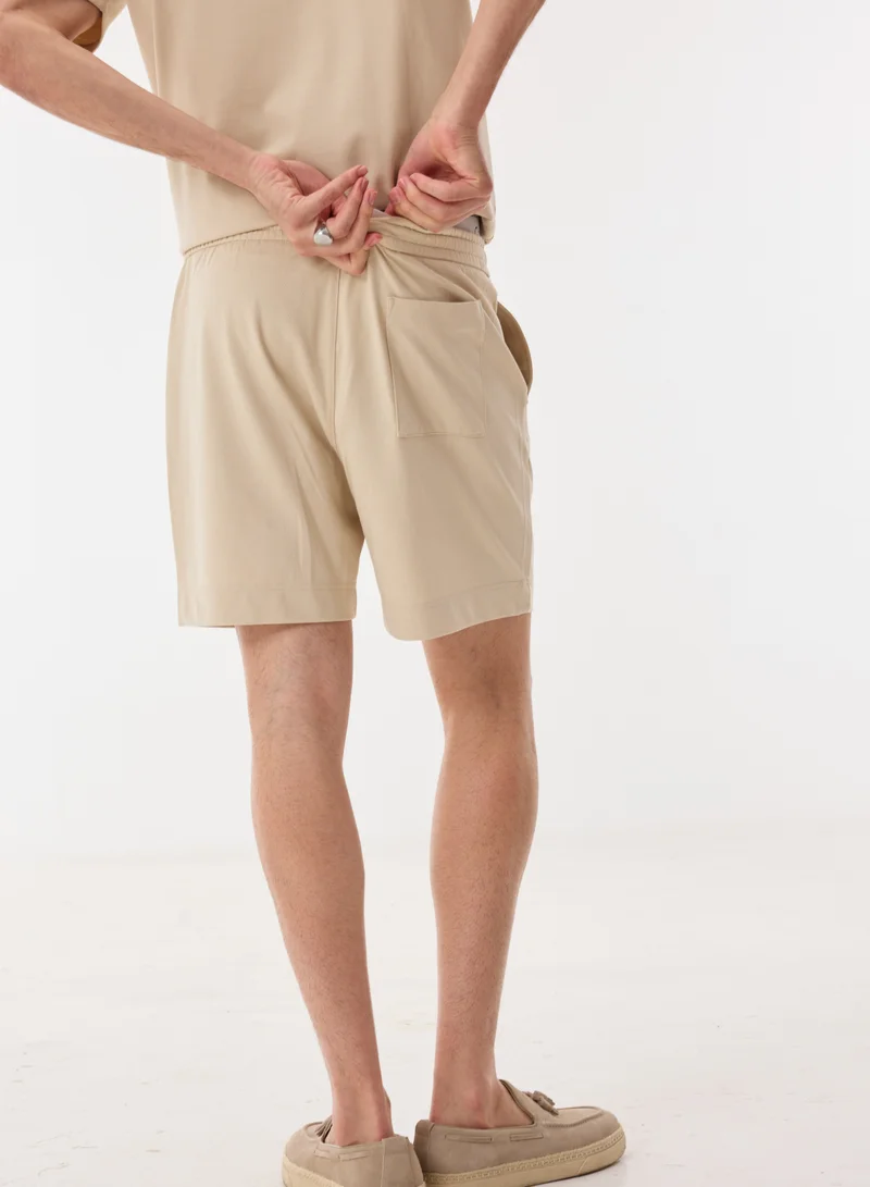 Ashita Fernandes  Solid Relaxed Fit Shorts for Men | Best Price UAE