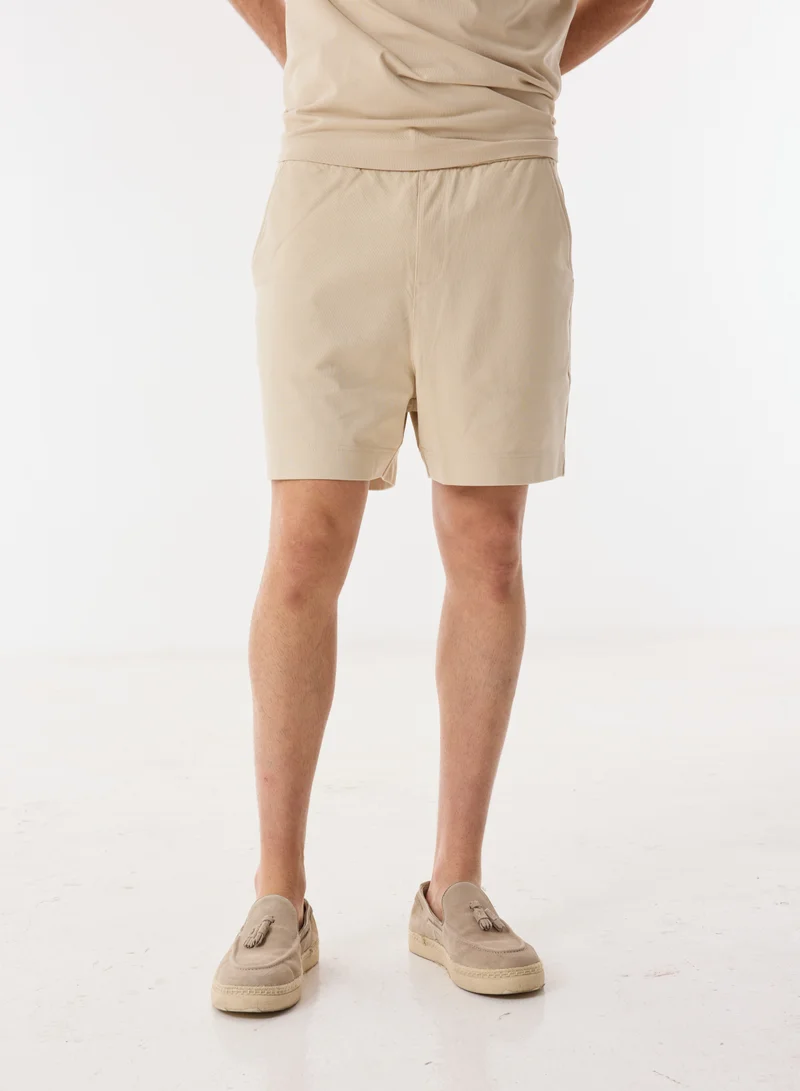 Ashita Fernandes  Solid Relaxed Fit Shorts for Men | Best Price UAE