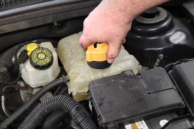 Mityvac MV4530 Automotive Cooling System Pressure Test Kit, Hand-Operated, Push-Button Valve, Self-Locking Quick-disconnects, Includes 4 Radiator/Coolant Bottle-Neck Adapters, Custom Molded Case - Image 3