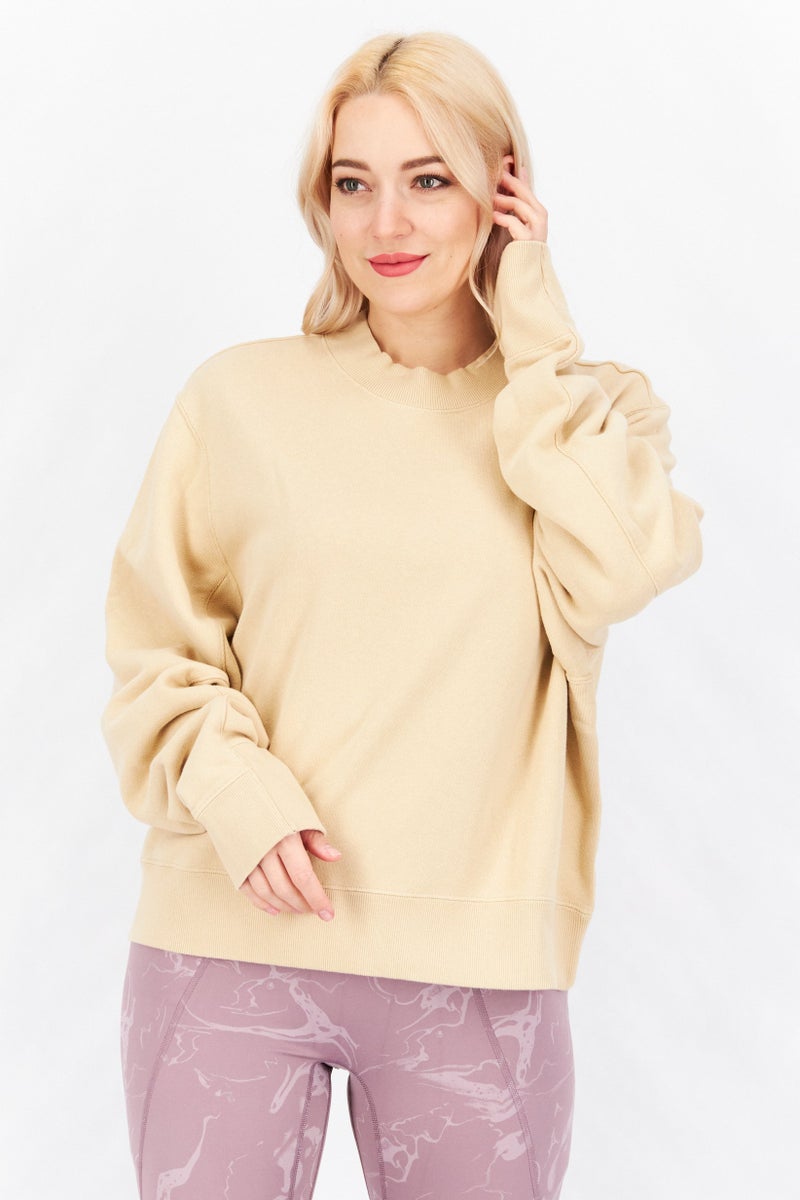 PUMA Women Sportswear Fit Long Sleeve Training Plain Sweatshirt, Beige - Image 1