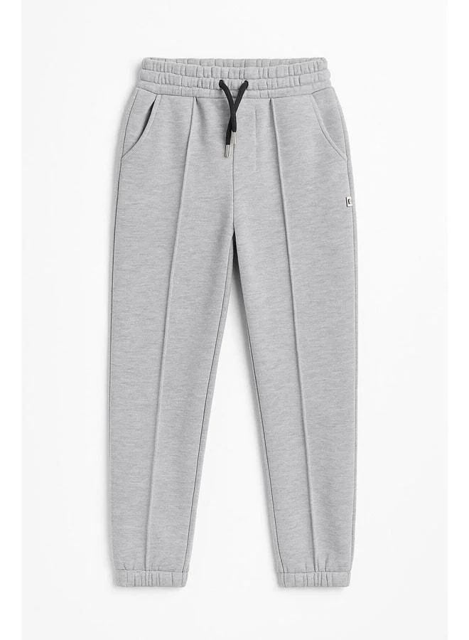 Perendi Gray Elasticated Fleece-Lined Pocketed Comfortable Unisex Kids Sweatpants.