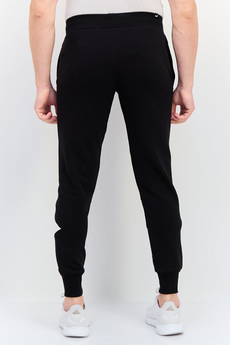 PUMA Men Regular Fit Brand Logo Outdoor Sweatpants, Black - Image 3