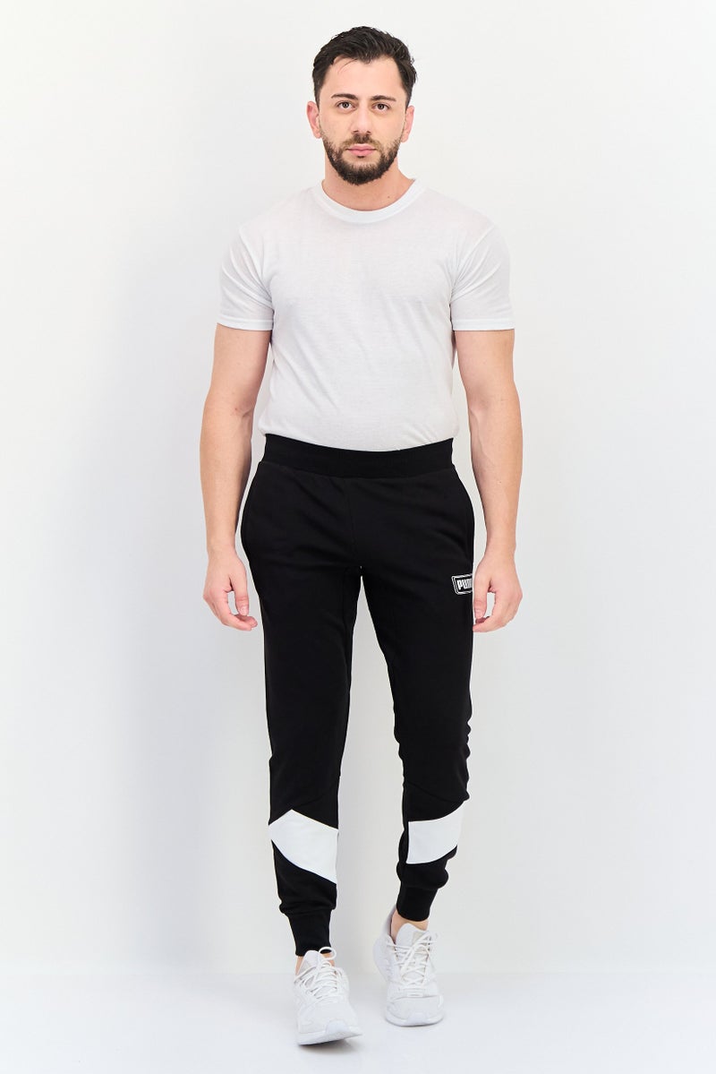 PUMA Men Regular Fit Brand Logo Outdoor Sweatpants, Black - Image 4