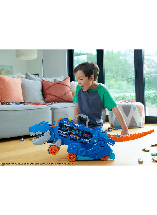 هوت ويلز City Ultimate Hauler, Transforms Into Stomping T-Rex With Race Track, Lights And Sounds, Toy Storage For 20+ 1:64 Scale Cars